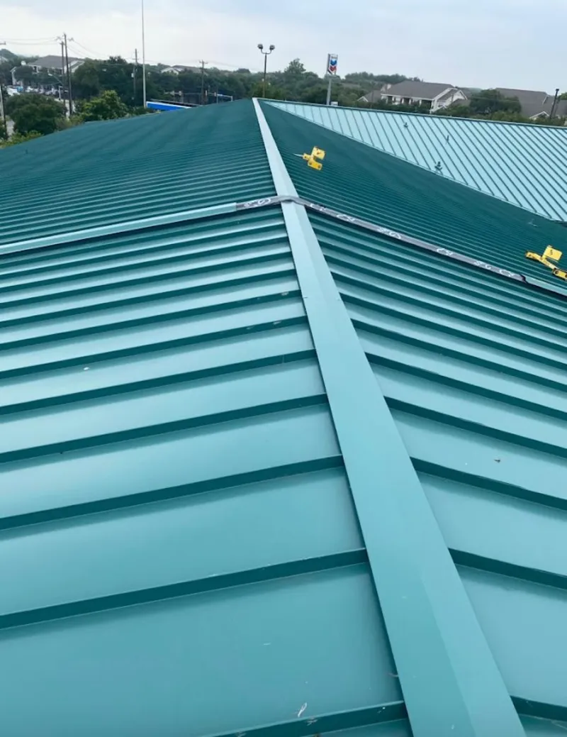 Green commercial metal roof ridge and valley for Metal Roof Repair in Raisin